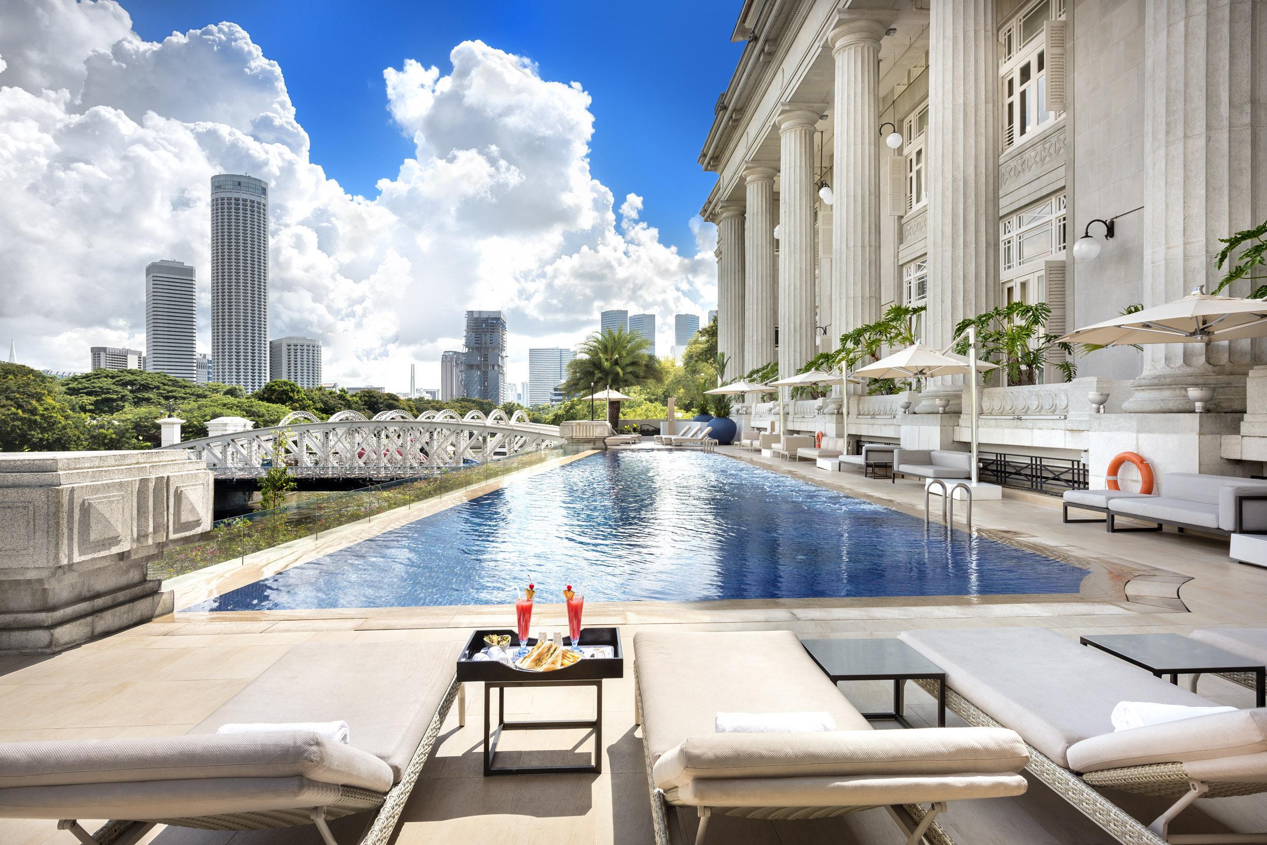 The Fullerton Hotel Сінгапур Екстер'єр фото The pool at the Raffles Hotel Le Royal